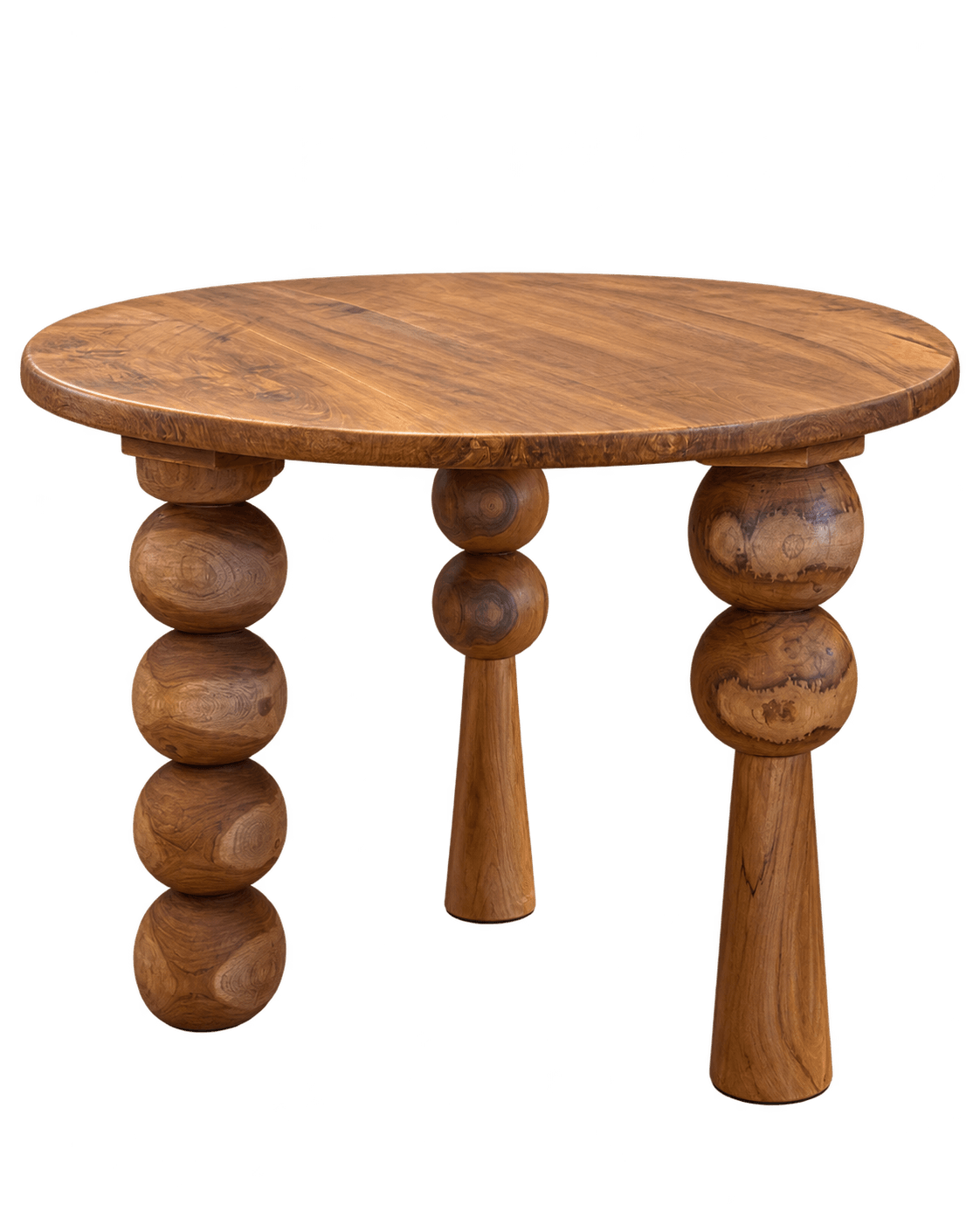 Table ronde à pieds sculptés